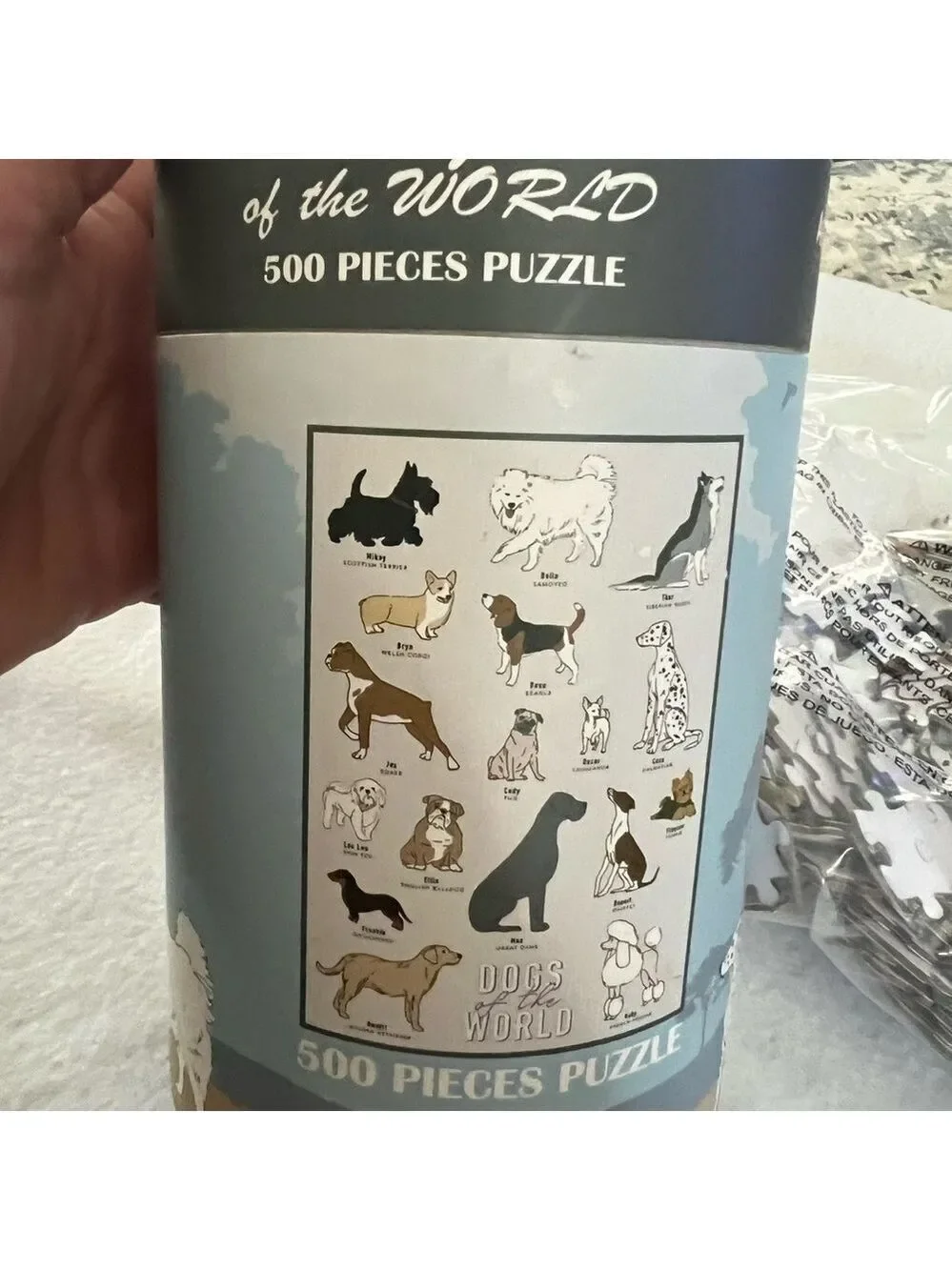 New Dogs of the World 500 piece puzzle. 19.7x13.8”. Pieces still sealed